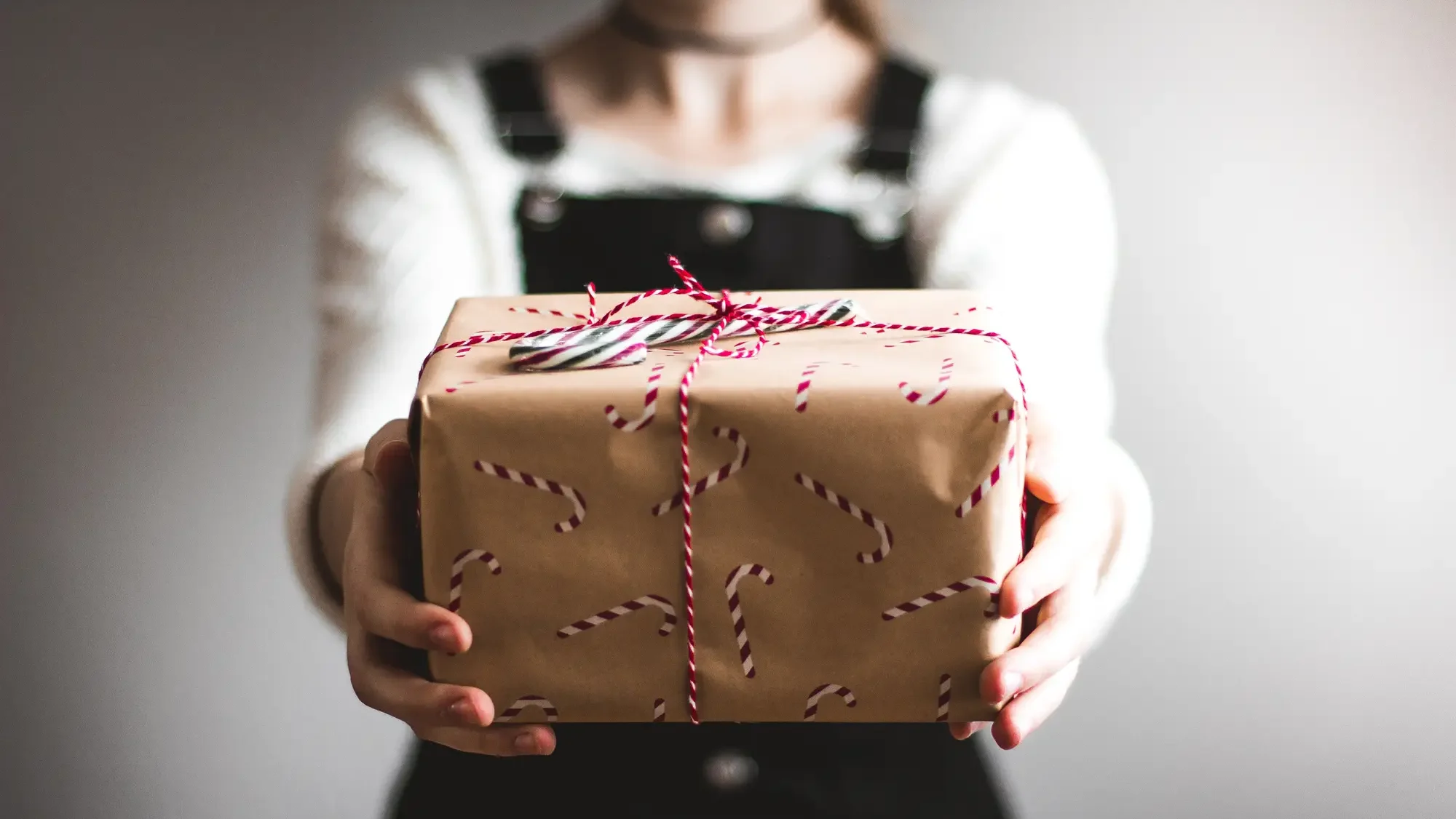 Woman Holding Christmas Present