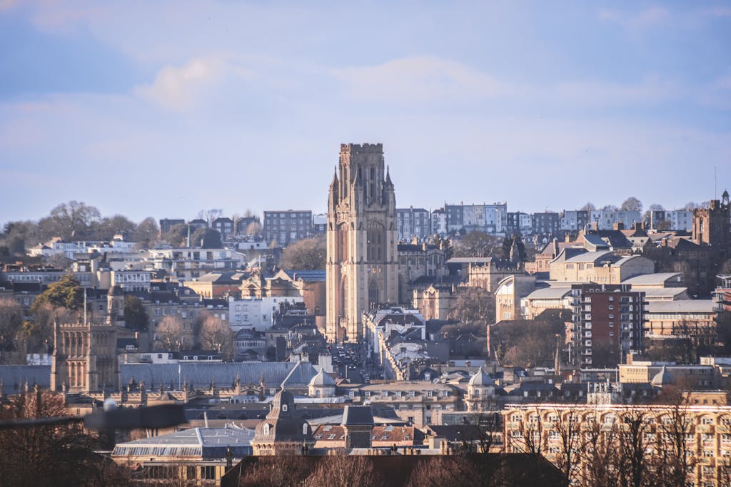 A stunning view of the Wills Memorial Building amidst the urban landscape of Bristol, England.